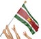 Team of peoples hands raising the Suriname national flag