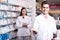 Team of pharmaceutist and technician working in chemist shop