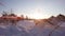 A team of sled dogs pulling a sled through the wonderful winter calm winter forest. Riding husky sledge in Lapland