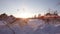 A team of sled dogs pulling a sled through the wonderful winter calm winter forest. Riding husky sledge in Lapland