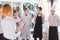 A team of waiters conduct a briefing on the summer terrace of the restaurant