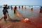 Team work of fisherman on beach