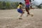 teams of teenage and young boys playing soccer