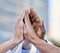 With teamwork we can accomplish anything. Shot of a group of unrecognizable doctors giving each other a high five