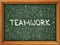 Teamwork Concept. Doodle Icons on Chalkboard.