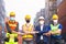 Teamwork engineer technician and foreman and partner wearing protection face mask and safety helmet in cargo container shipping.