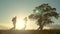 Teamwork. group men silhouette hikers with backpacks walk along trail next go travel to the mountains up top near the