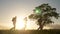 Teamwork. group men silhouette hikers with backpacks walk along trail next go travel to the mountains up top near the