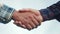 Teamwork handshake concept. two people shake hands lifestyle shaking hands. different skin colors shake hands conclude a