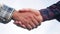 Teamwork handshake concept. two people shake lifestyle hands shaking hands. different skin colors shake hands conclude a