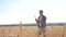 Teamwork smart farming slow motion video. farmer work in wheat field. farmer explore are studying. man with digital