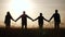 Teamwork. team community hold hands together silhouette at sunset unity. group business of people hands. teamwork a