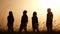 teamwork. team of tourists greet each other rejoice in success silhouette. business teamwork a travel tourism concept