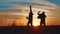 Teamwork victory business tourism concept. two hiker sunshine sunset men tourists men rejoice hands in top success