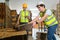 Teamwork of Warehouse worker courier inspecting checklist stock cardboard boxes for sale with warehouse workers characters