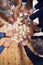 Teamwork will provide all the solutions. High angle shot of a group of businesspeople building a puzzle together in an