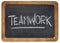 Teamwork word on blackboard