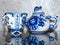 Teapot and Cup. Home tableware in Russian traditional Gzhel style. Closeup. Gzhel - Russian folk craft of ceramics