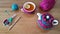 Teapot and cup of tea with knitted covers