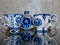 Teapot and Cups. Home tableware in Russian traditional Gzhel style. Closeup. Gzhel - Russian folk craft of ceramics