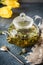 Teapot with detox drink from peppermint Tea boiled hot water dro