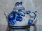 Teapot. Home tableware in Russian traditional Gzhel style. Closeup. Gzhel - Russian folk craft of ceramics