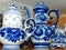 Teapots. Home tableware in Russian traditional Gzhel style. Closeup. Gzhel-Russian folk craft of ceramics and production porcelain