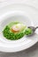 Tear peas with poached egg, spanish basque cuisine