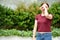 Tearful Beautiful Redhead Female Wearing Jeans Standing