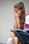 Tearful Catholic Colombian Female Student With Notebook