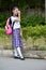 Tearful Cute Minority Person Wearing School Uniform With Notebooks