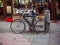 Tearoom and lounge sign on a vintage bike in the street of Brick Lane, Shoreditch