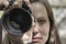 Tears and experience of a reporter`s photographer`s girl, who is filming the suffering of people in the war. Female