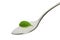 Teaspoon with sugar and stevia leaf