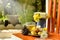 Teatime with Chinese pastry and tea and flower on a orange chair