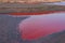 Technical settler of industrial water of mining industry in Kryvyi Rih, Ukraine. Red water polluted with iron ore waste