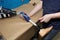 A technician adjusts a prosthetic foot.