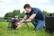 Technician Fixing Camera On UAV Helicopter