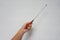 Technician hold long thin screwdriver