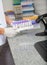 Technician Holding Test Tube Holder In Laboratory