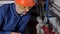 Technician inspecting heating system in boiler room