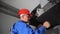 Technician man Install Filter for Central Air Ventilation Recuperation System
