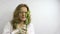 Technician woman examine flasks with modified pea plants