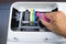 Technicians are install setup the ink cartridge of a inkjet printer the device of office