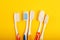 Techniques for storing toothbrushes and cleaning brushes