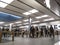 Technology crazed people shopping inside an Apple store for the latest iPhones and