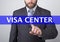 Technology, internet and networking concept - Businessman presses visa center button on virtual screens. Internet