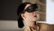 technology, online game, entertainment, virtual world in 3D simulation. millennial woman in vr glasses plays at home, 3d