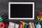Technology and school concept. Remote studying concept. Top above overhead view photo of tablet apple and colorful stationery