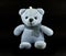 TEDDY BEAR blue color with scarf on black background